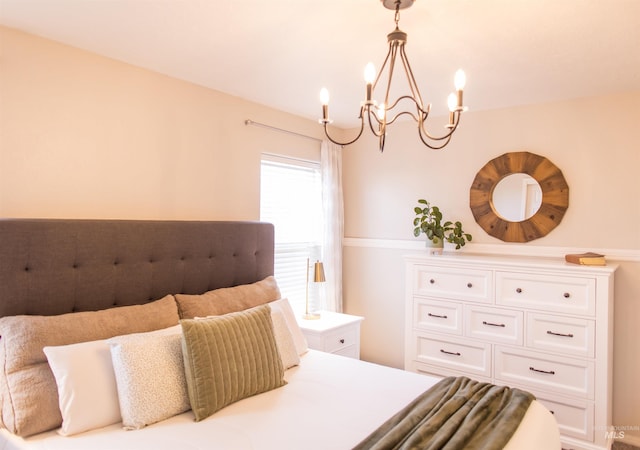 bedroom with a chandelier