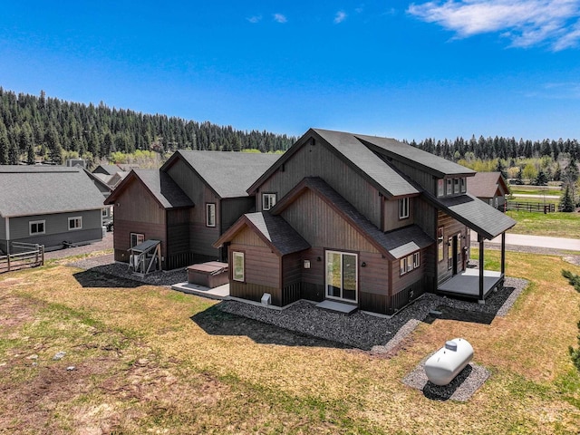 1089 Graham Dr, Mccall, ID 83638 - view of front of property featuring a view of trees and roof with shingles