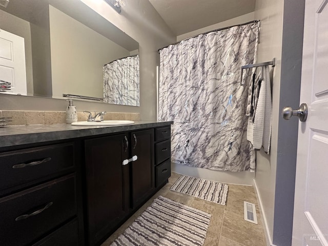 12030 Abram St, Boise, ID 83713 - bathroom featuring vanity, tile patterned flooring, and a shower with shower curtain