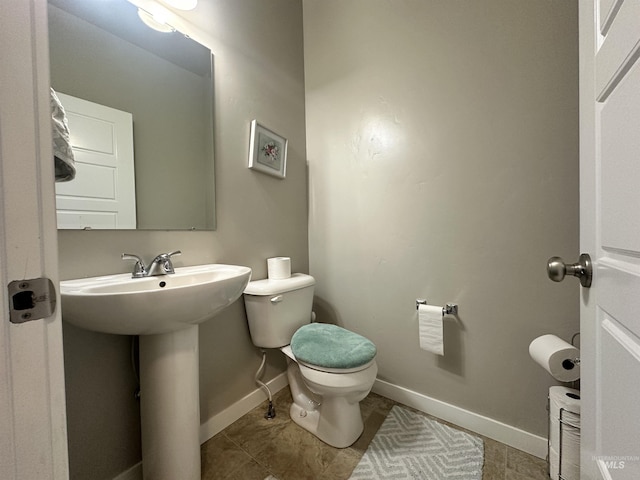 12030 Abram St, Boise, ID 83713 - half bathroom featuring toilet and baseboards