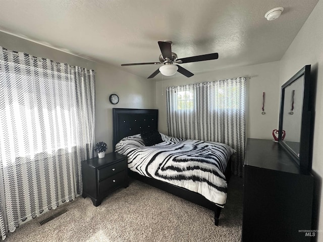 12030 Abram St, Boise, ID 83713 - bedroom featuring light carpet and a ceiling fan