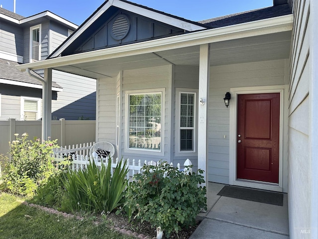 12030 Abram St, Boise, ID 83713 - doorway to property with roof with shingles and a porch