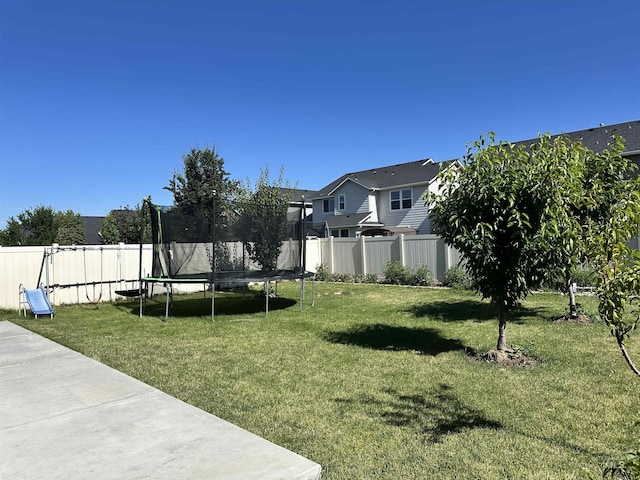 12030 Abram St, Boise, ID 83713 - fenced backyard featuring a trampoline