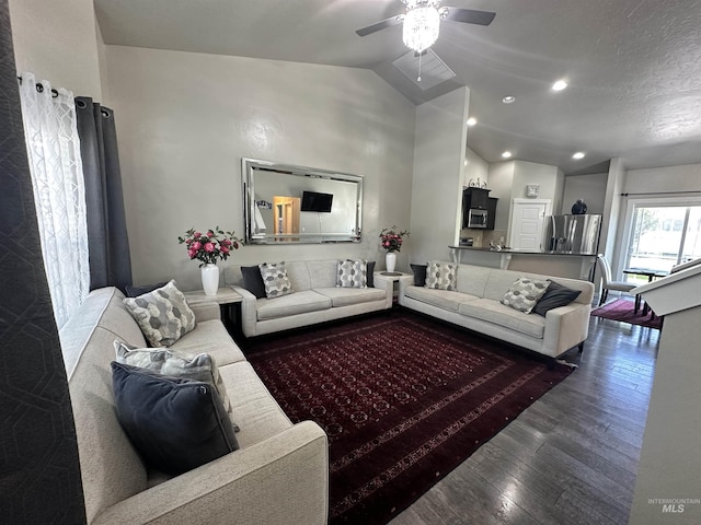 12030 Abram St, Boise, ID 83713 - living area with vaulted ceiling, wood finished floors, a ceiling fan, and recessed lighting