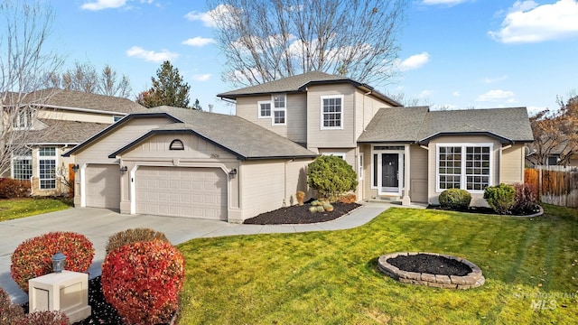 front of property featuring a garage and a front lawn