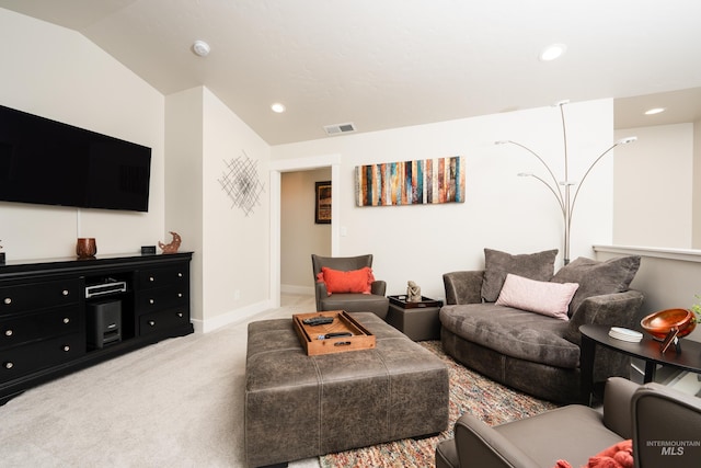 living room featuring visible vents, baseboards, lofted ceiling, recessed lighting, and light colored carpet