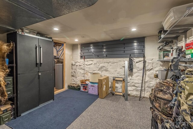 finished below grade area with recessed lighting and carpet floors