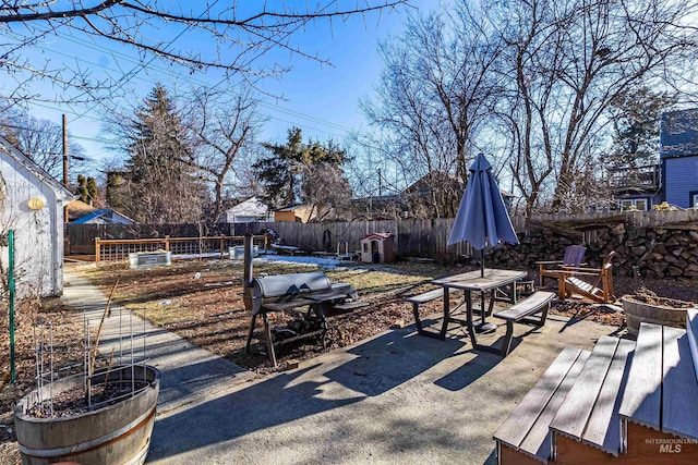 view of patio / terrace with outdoor dining space and a fenced backyard