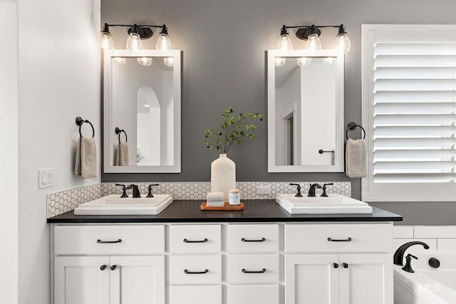 bathroom featuring vanity and a bathtub