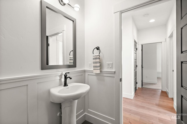 bathroom featuring hardwood / wood-style flooring