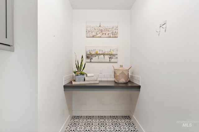 interior details featuring tile patterned floors