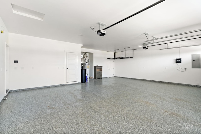 garage with a garage door opener, gas water heater, and electric panel