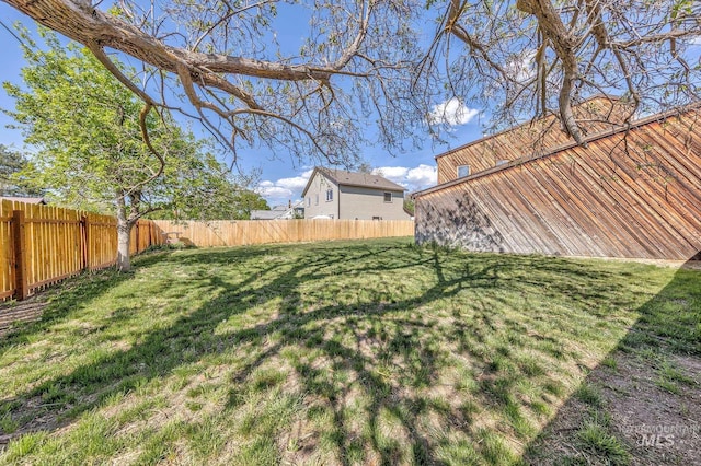 view of yard featuring a fenced backyard