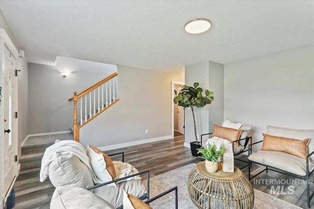 2513 S Vineyard St, Nampa, ID 83686 - living area featuring stairway, wood finished floors, and baseboards