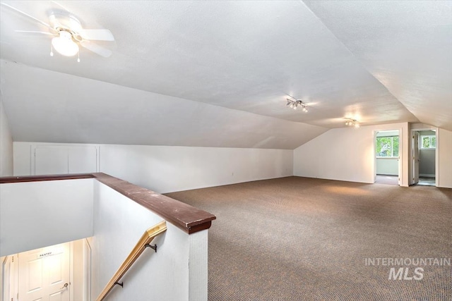 7301 W Diamond St, Boise, ID 83709 - bonus room featuring lofted ceiling, carpet flooring, and ceiling fan