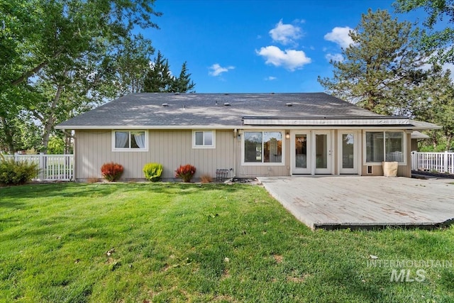 7301 W Diamond St, Boise, ID 83709 - back of property with a wooden deck