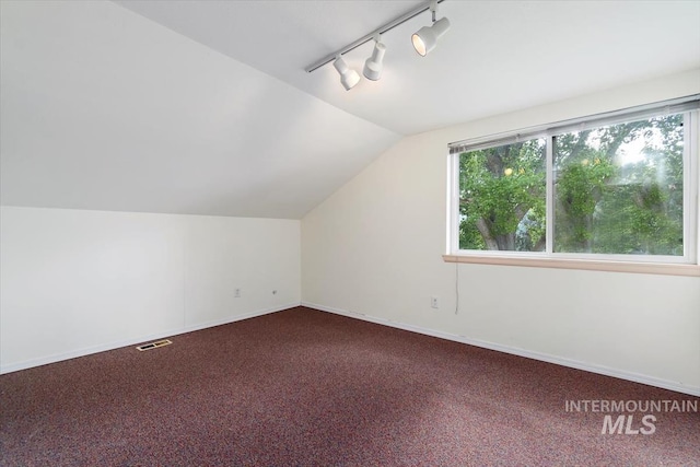 7301 W Diamond St, Boise, ID 83709 - bonus room with carpet flooring, plenty of natural light, lofted ceiling, and baseboards
