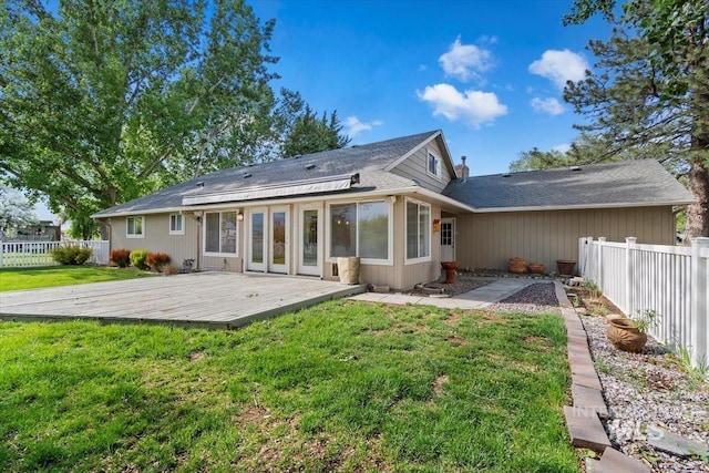 7301 W Diamond St, Boise, ID 83709 - rear view of house with a deck and roof with shingles