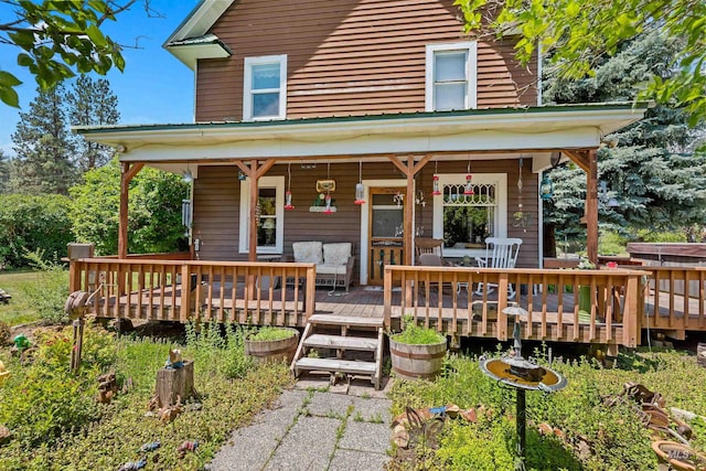 view of front of property with a wooden deck