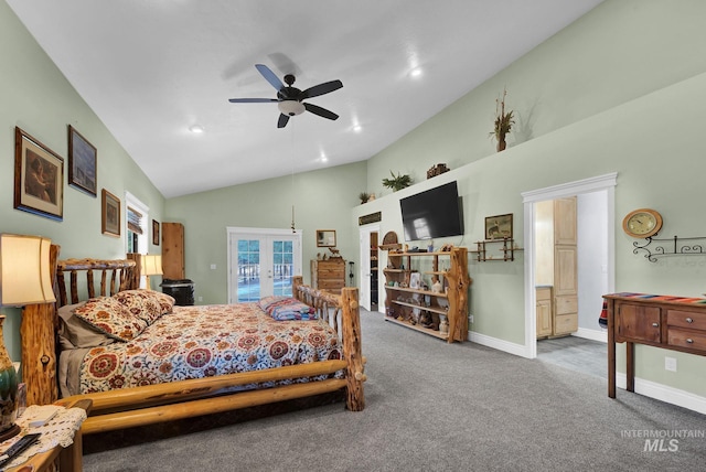 carpeted bedroom with ceiling fan, vaulted ceiling, ensuite bathroom, and french doors