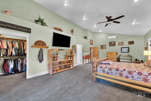 carpeted bedroom with ceiling fan, a closet, and high vaulted ceiling