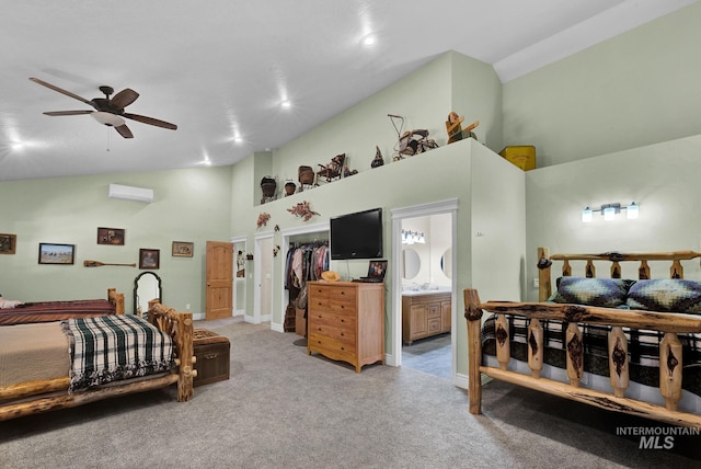 bedroom with light carpet, high vaulted ceiling, ensuite bathroom, ceiling fan, and a closet