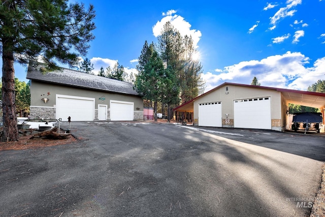 view of front of house featuring a carport