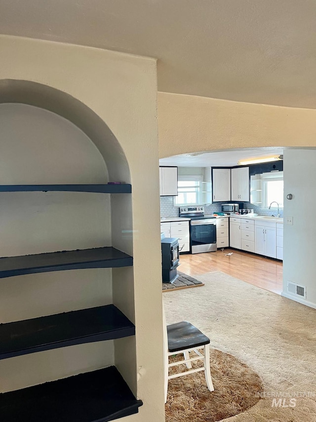 interior space with visible vents and carpet floors
