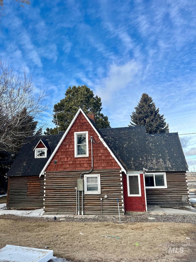 view of front of property with log siding