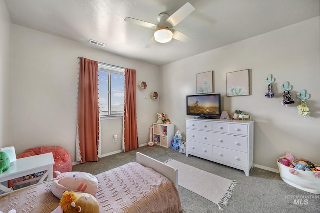 bedroom featuring ceiling fan and carpet floors