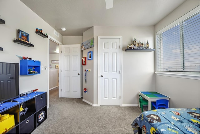 bedroom with carpet floors and ceiling fan