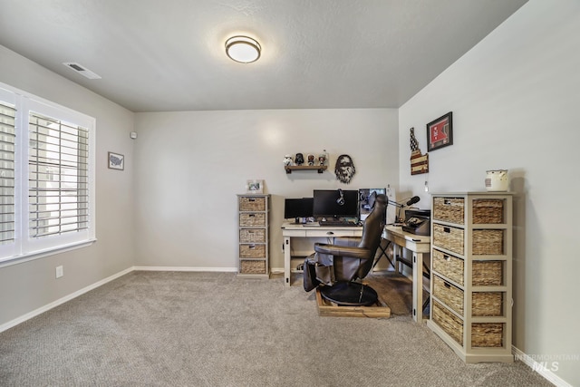 view of carpeted home office