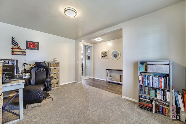 view of carpeted home office