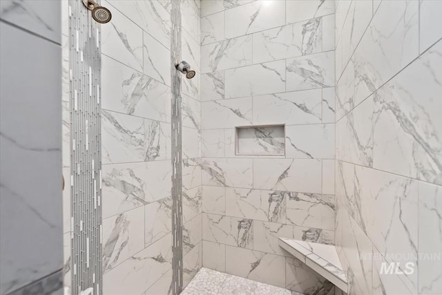 1552 W Windbreaker Ln, Eagle, ID 83616 - bathroom featuring a tile shower