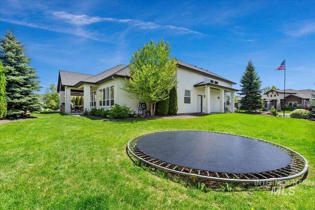 1552 W Windbreaker Ln, Eagle, ID 83616 - rear view of property featuring stucco siding