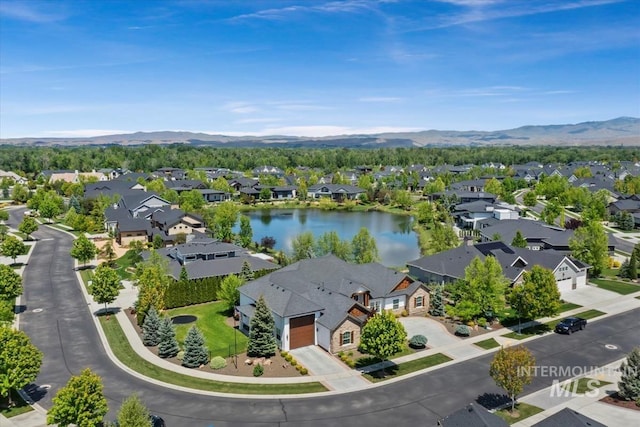 1552 W Windbreaker Ln, Eagle, ID 83616 - aerial view of residential area featuring a water and mountain view