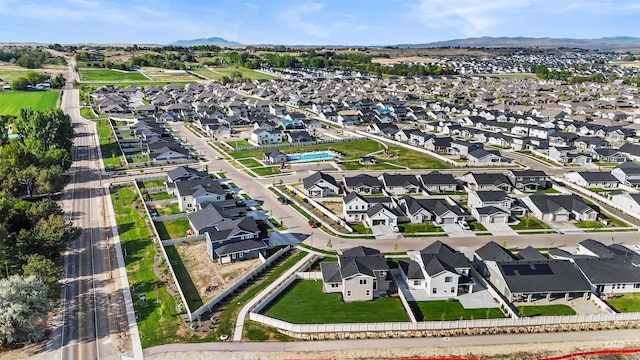 aerial perspective of suburban area featuring a mountainous background