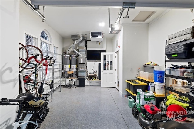 garage featuring water heater and a garage door opener