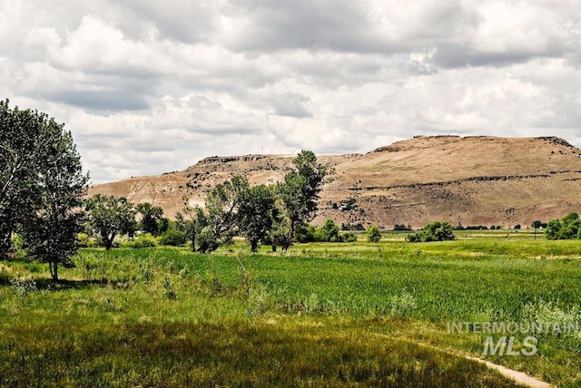 view of mountain feature featuring a rural view