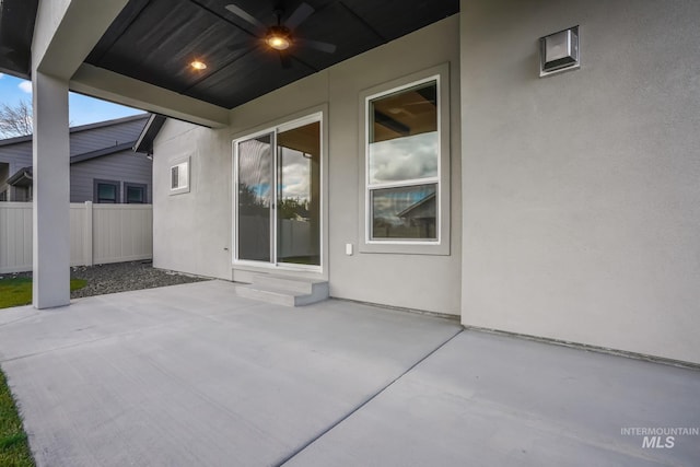 view of patio with ceiling fan