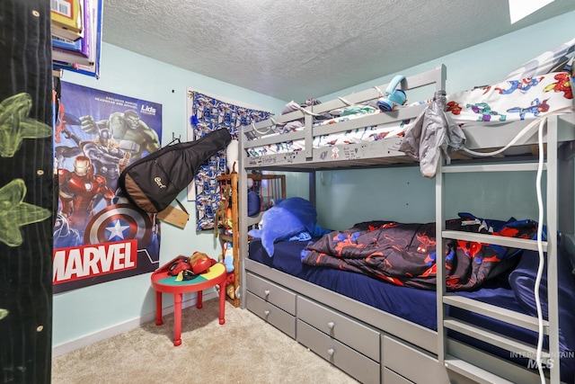 carpeted bedroom featuring a textured ceiling