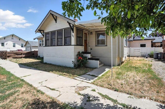 101 E 2nd St, Emmett, ID 83617 - view of front of property featuring a sunroom