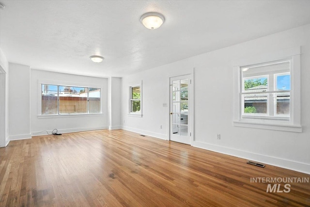 101 E 2nd St, Emmett, ID 83617 - unfurnished room featuring wood finished floors and baseboards