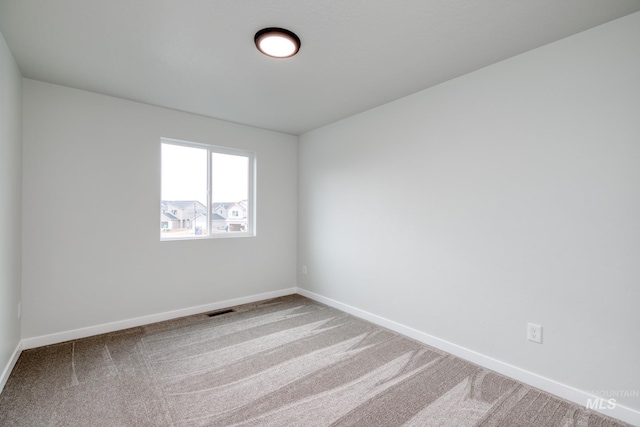 2839 N Rocky Bottom Way, Kuna, ID 83634 - empty room featuring baseboards, visible vents, and carpet