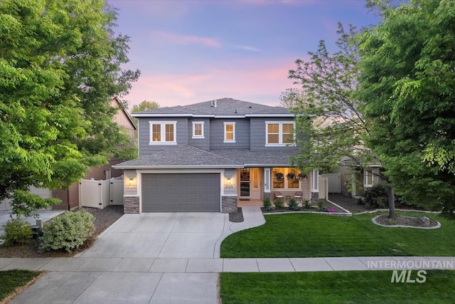 3023 E Tusa St, Meridian, ID 83642 - view of front of house with an attached garage, driveway, stone siding, roof with shingles, and a gate