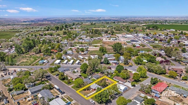 904 N 9th Ave, Buhl, ID 83316 - aerial view of property and surrounding area with property parcel outlined and nearby suburban area
