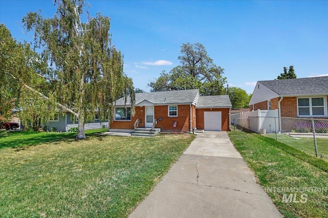 904 N 9th Ave, Buhl, ID 83316 - bungalow with driveway, an attached garage, and brick siding