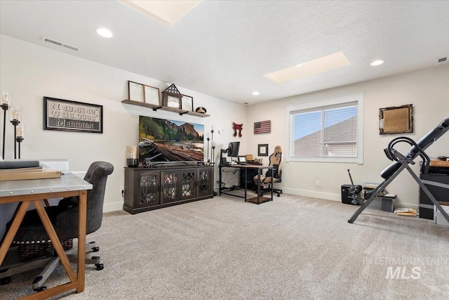 office featuring visible vents, recessed lighting, baseboards, and carpet