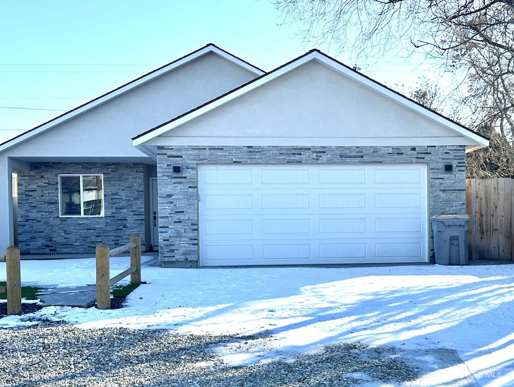 ranch-style home with a garage