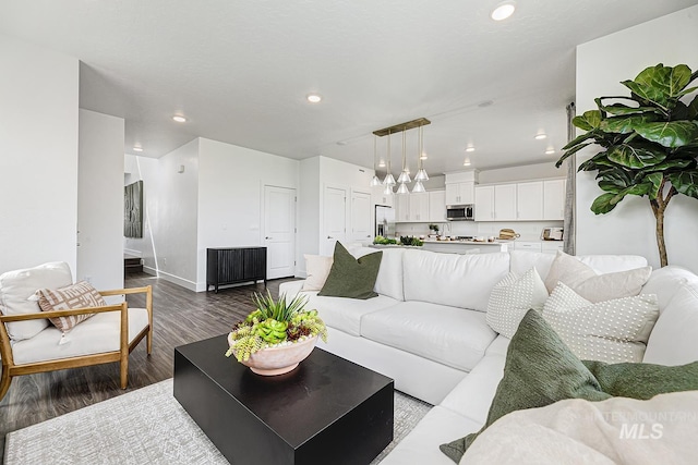 8002 W Fern St, Eagle, ID 83616 - living area featuring recessed lighting, dark wood finished floors, and baseboards